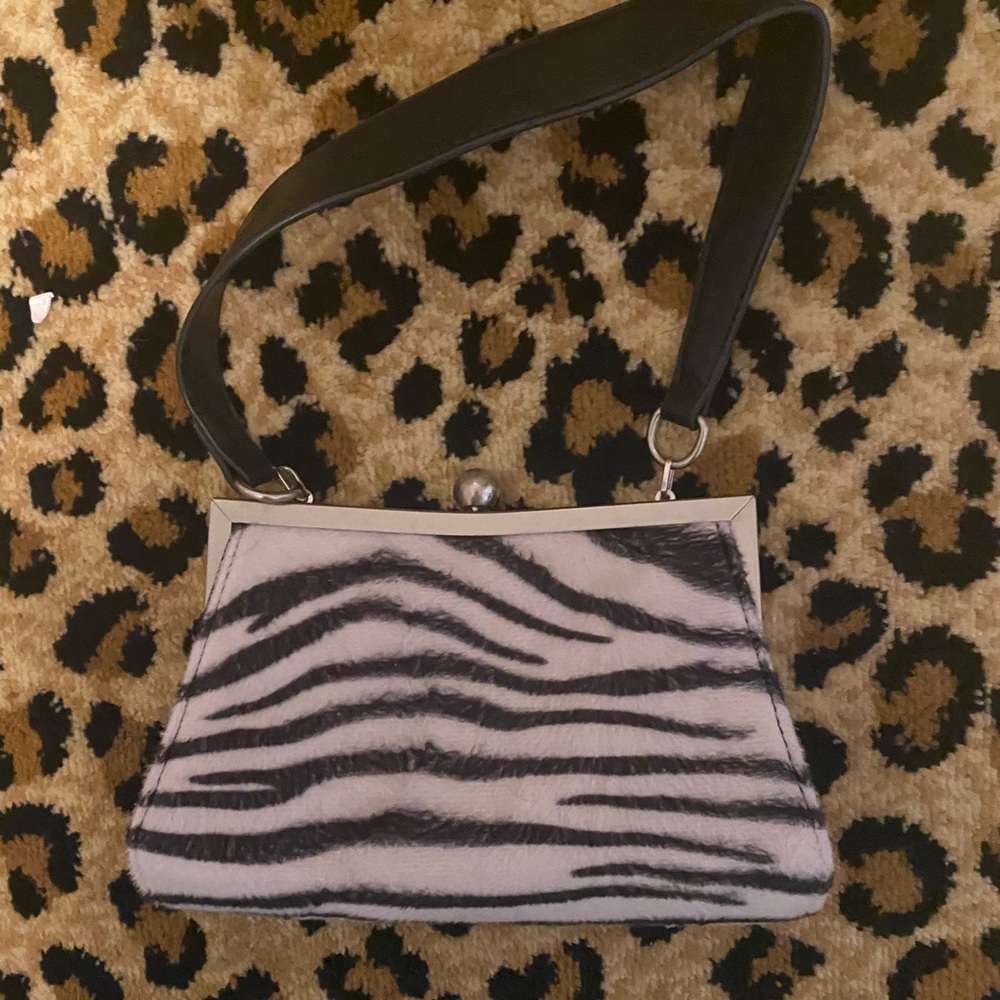 Delia‘s X dollskill zebra print hard mini bag